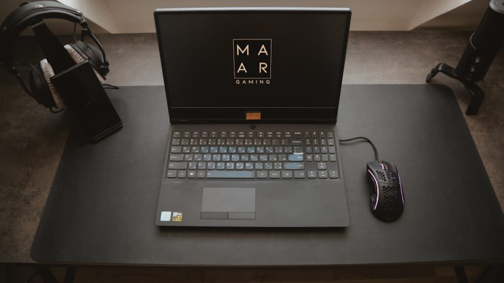 A financial advisor working on a laptop, symbolizing digital strategy.