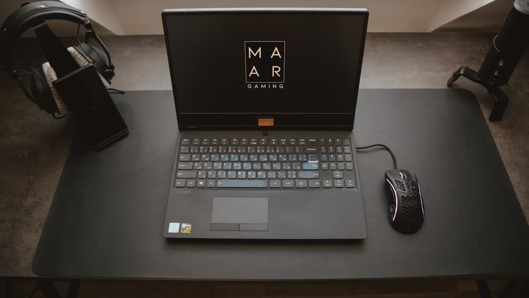 A financial advisor working on a laptop, symbolizing digital strategy.