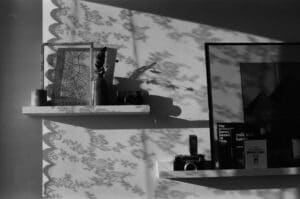 Stack of moving boxes in an office environment.