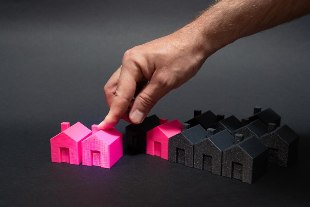 An image representing the intersection of real estate and technology, possibly showing a digital interface over a city skyline or a modern home.